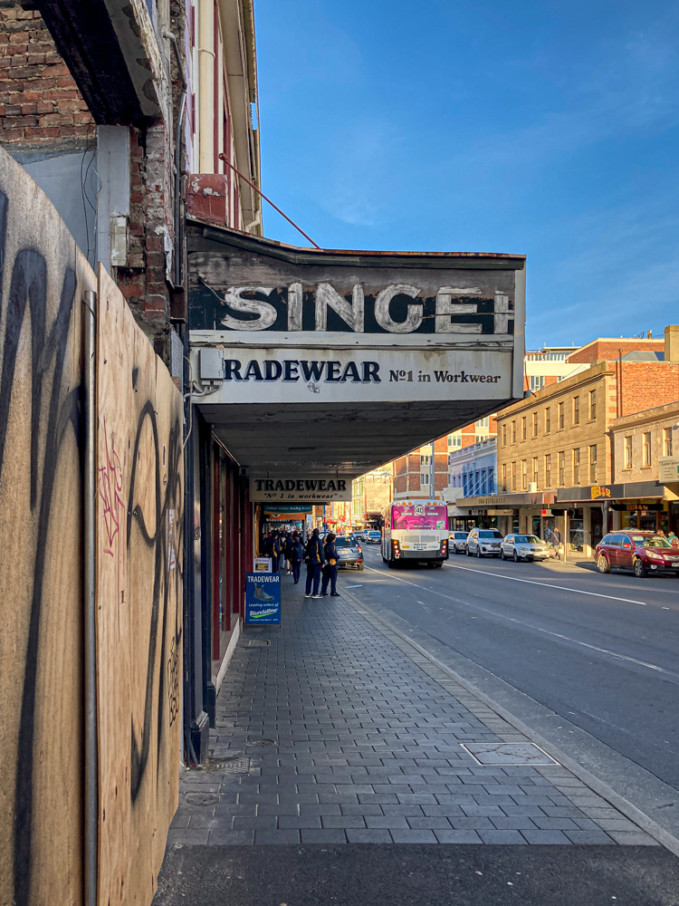 Old Singer sign on 135 Elizabeth Street revealed after demolition of 137 Elizabeth St