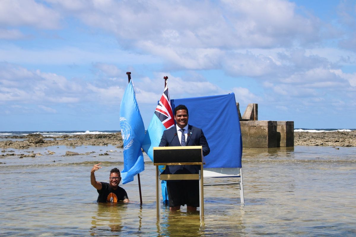 Tuvalu's Foreign Minister Simon Kofe addressed cameras while knee-deep in the ocean to highlight the sea level rises affecting his nation - Ministry of Justice, Communication and Foreign Affairs, Tuvalu Government via Reuters