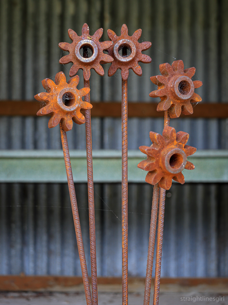 Sculpture of flowers made from salvaged materials