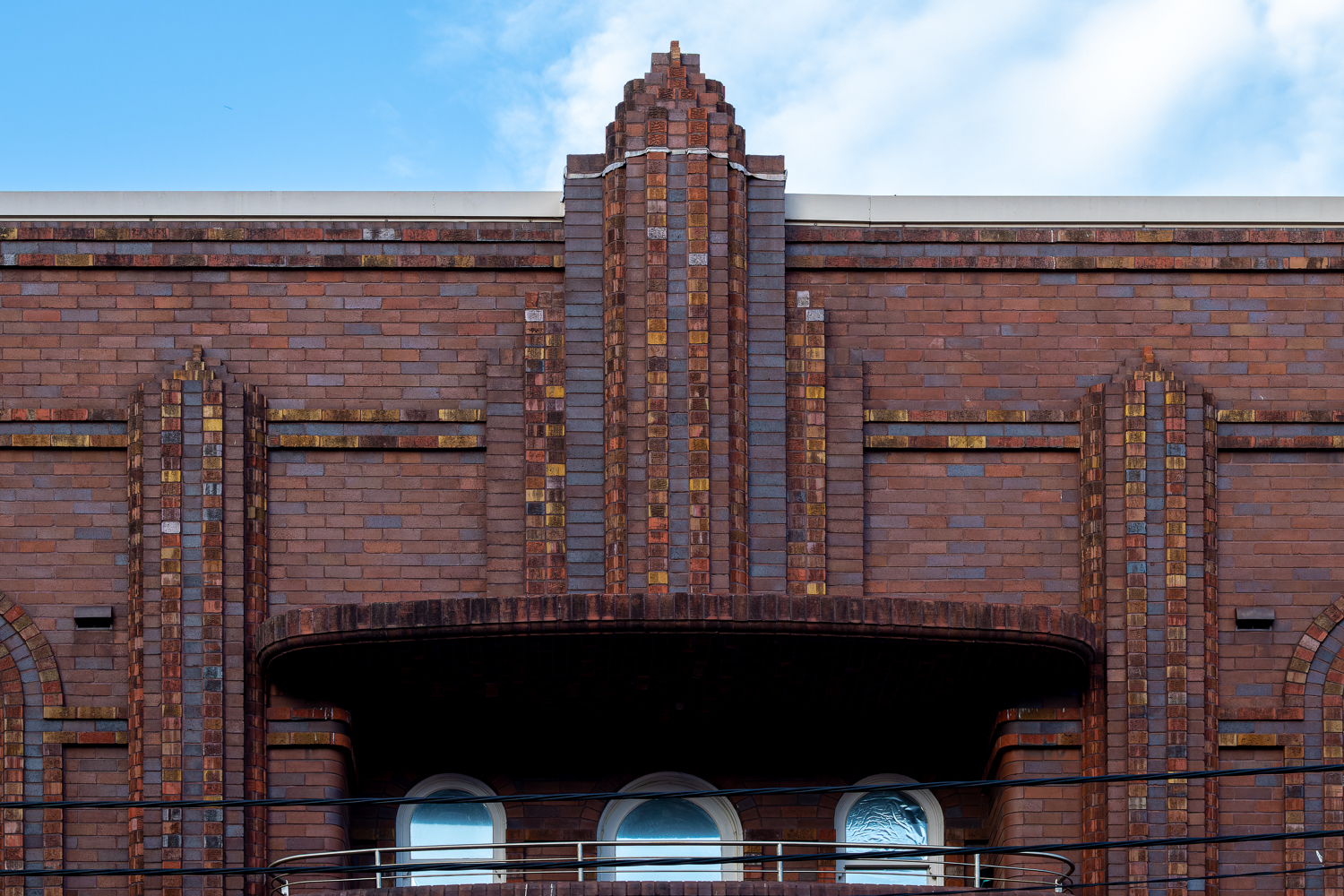 A red brick "skyscraper" parapet and facade