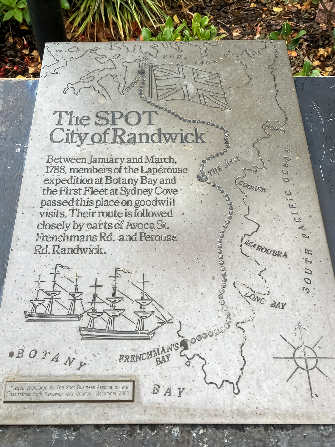 The Spot: City of Randwick. A silver plaque with a map of the Sydney coast describing goodwill visits passing through this area in 1788