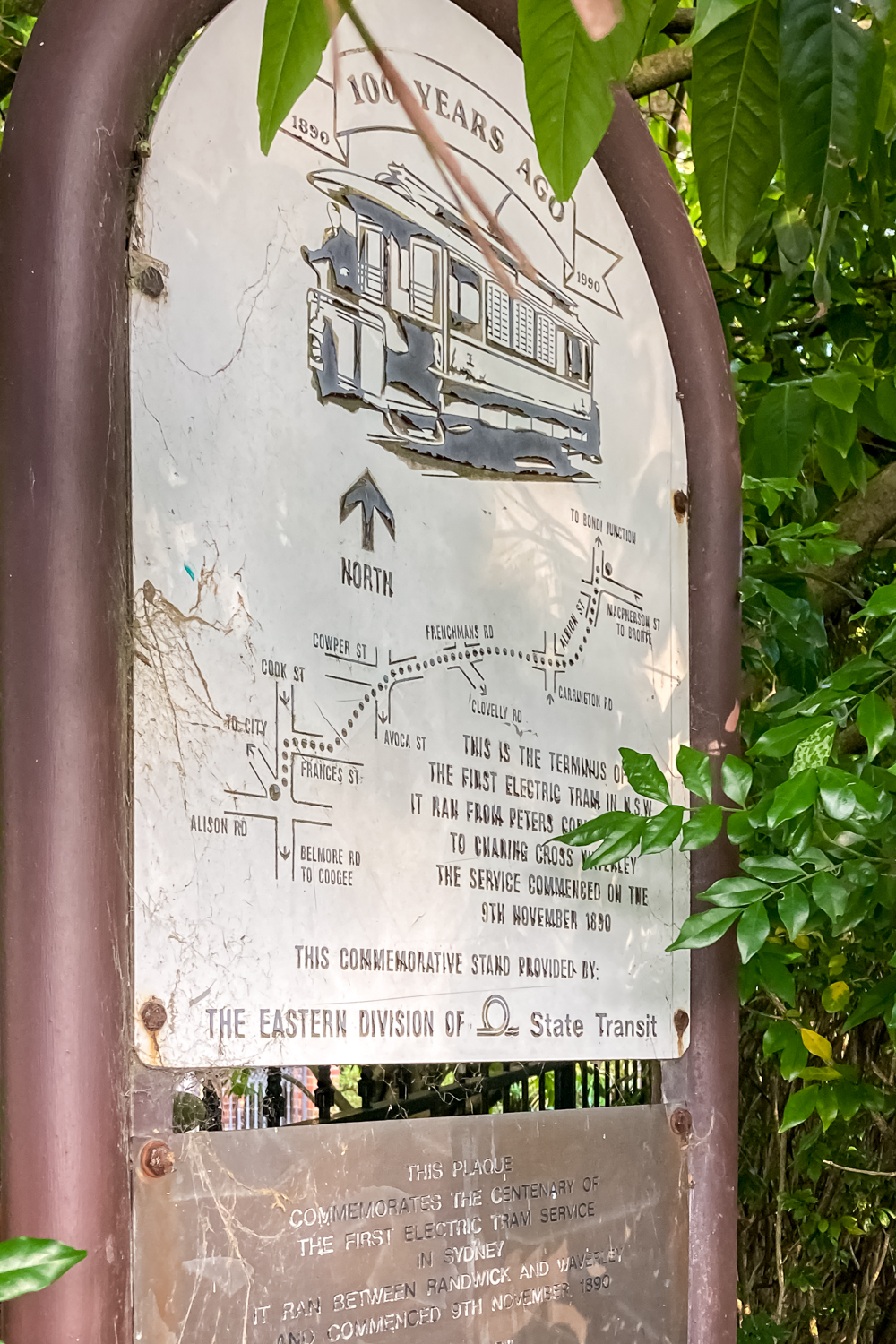 A sign commemorating the site of the first electric train in NSW running between Randwick and Waverley in November 1890