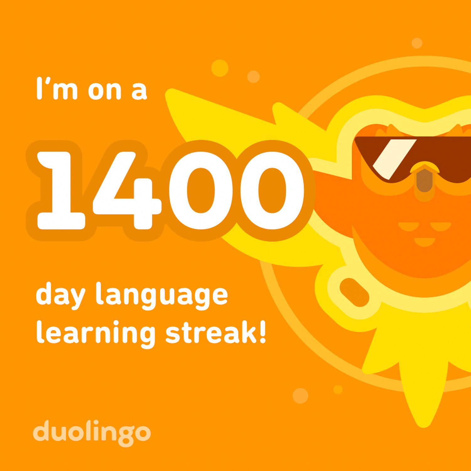 An orange tile with a cartoon owl wearing sunglasses and the text "I'm oo a 1400 day language learning streak" in white letters