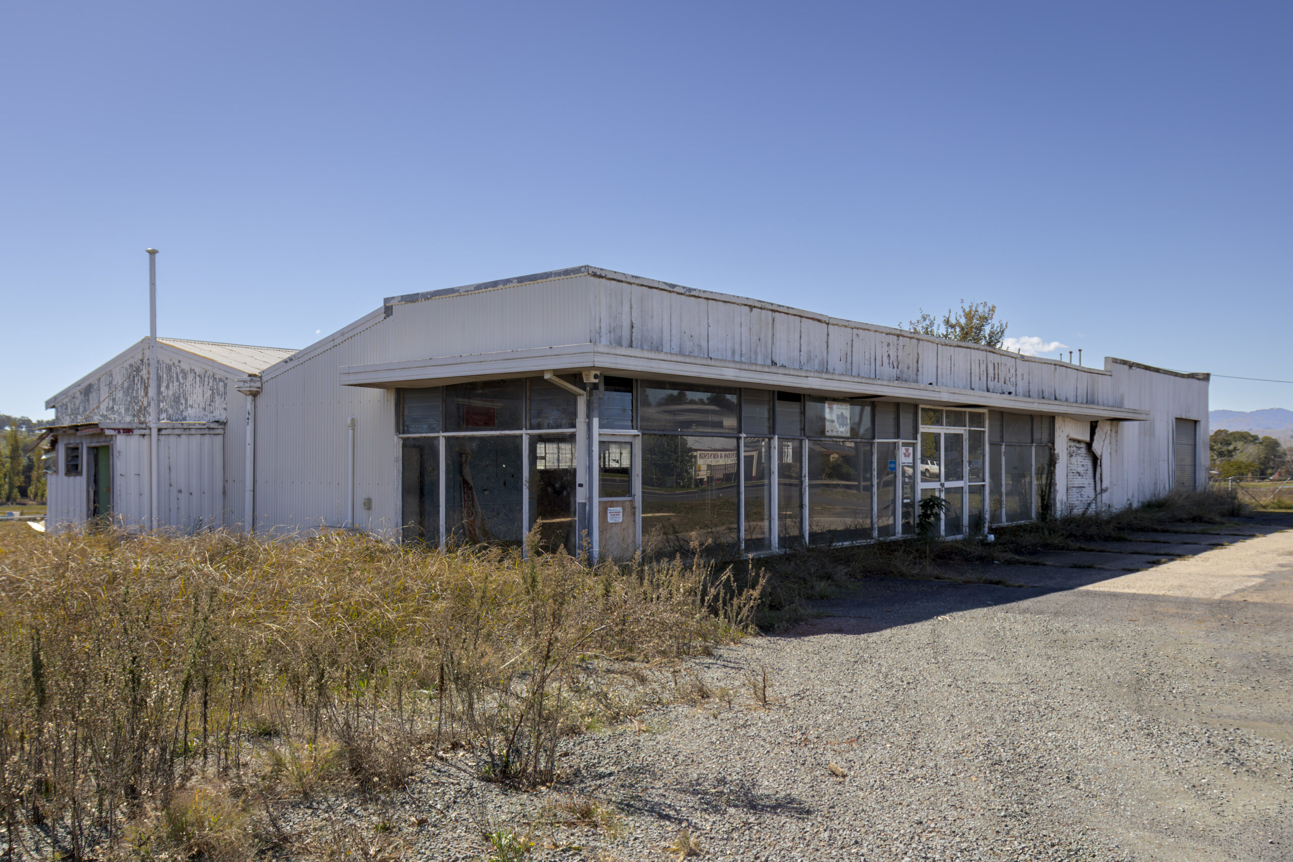 An abandoned farm machinery showroom