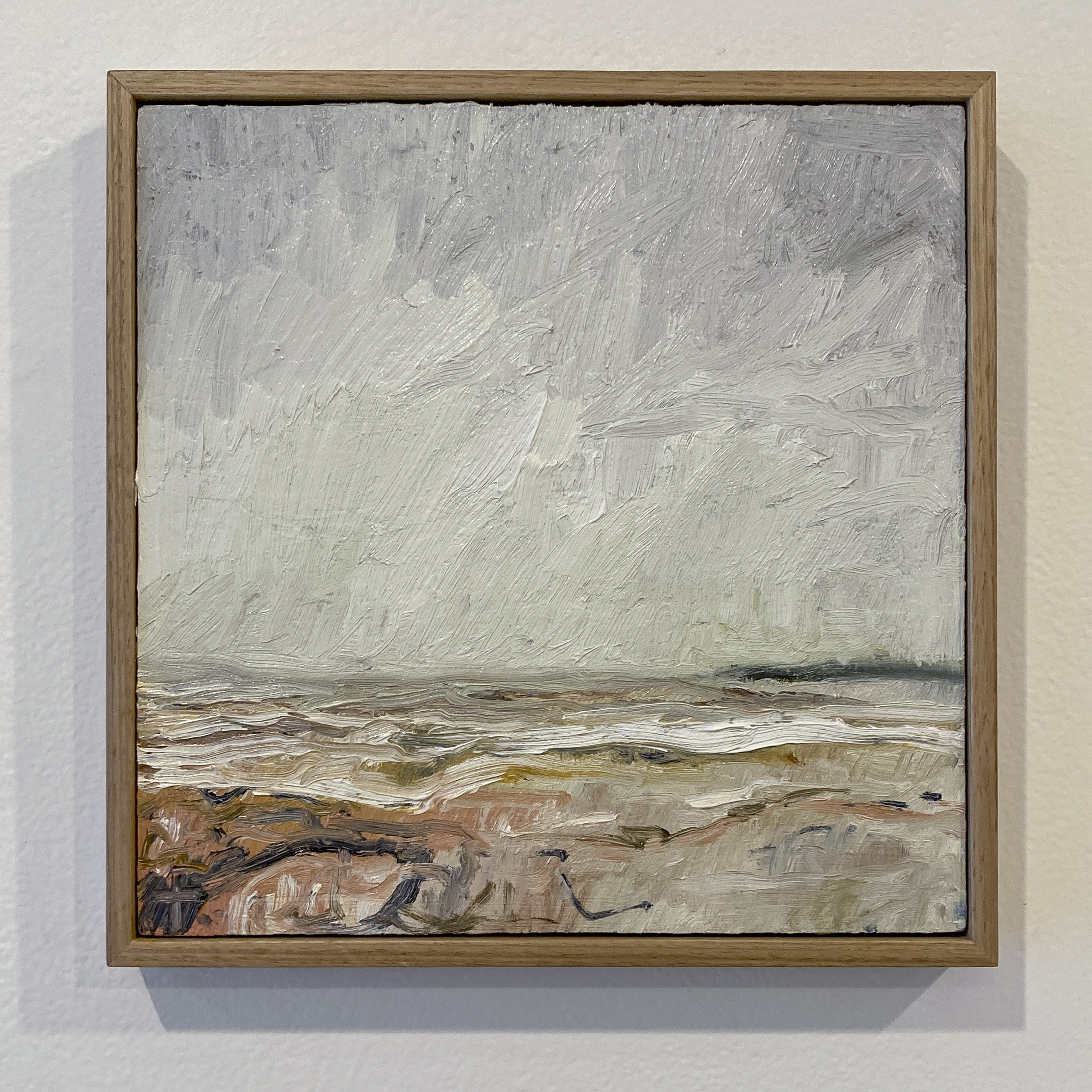 A square oil painting featuring muted tones of a seaside in winter