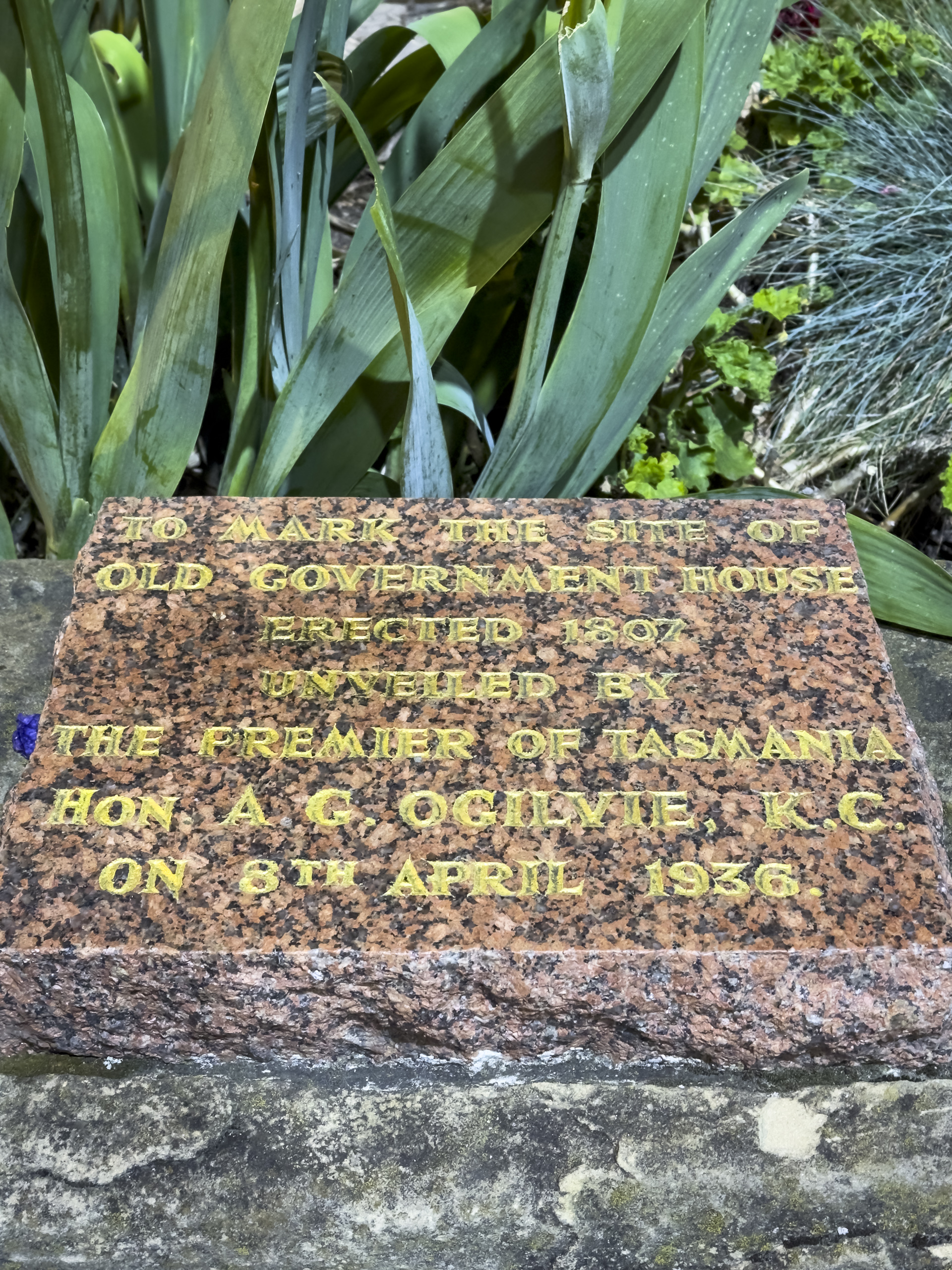 A plaque marking the site of Old Government House, erected 1807, unveiled by the Premier A G Ogilvie in 1936