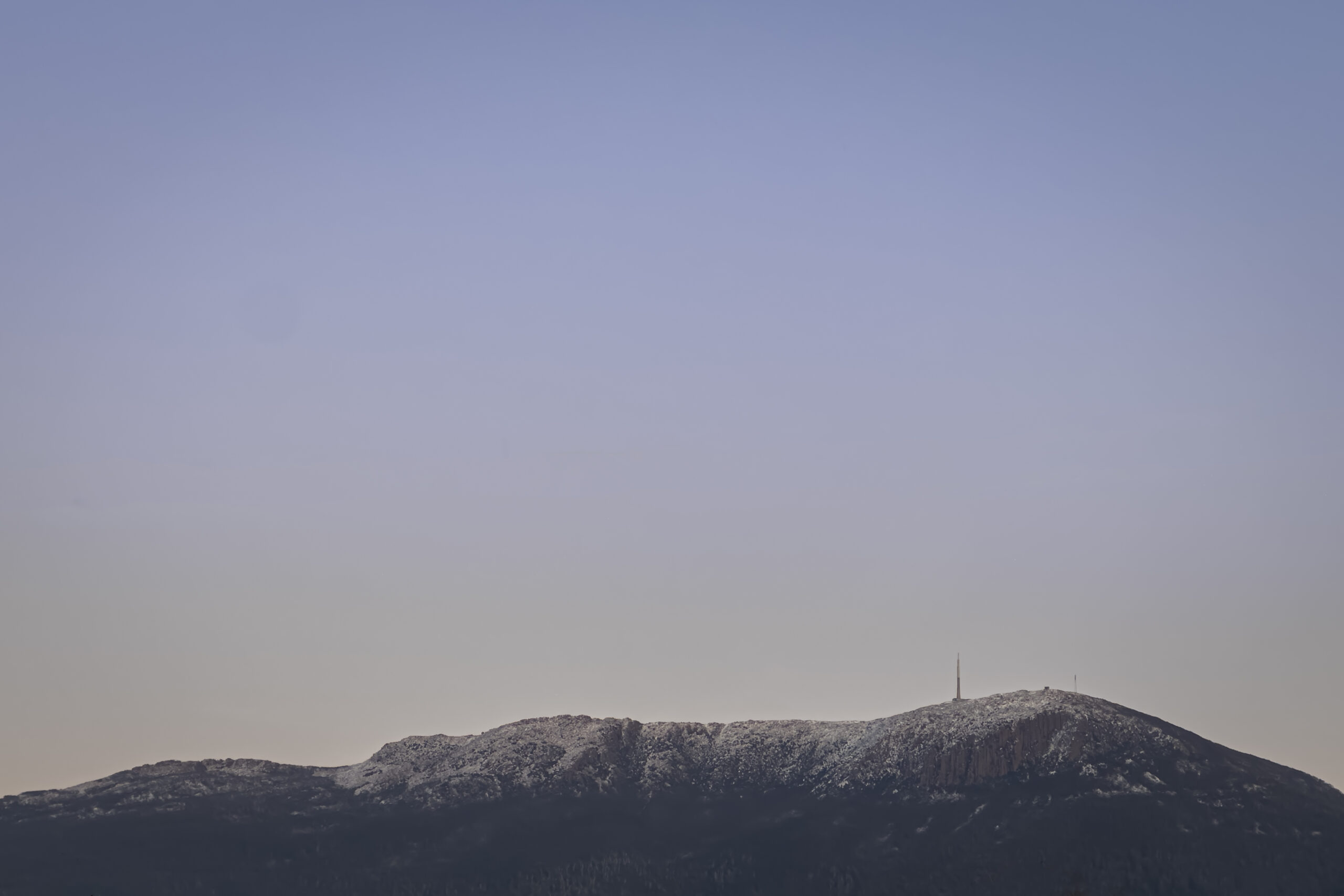 a snow-topped mountain summit