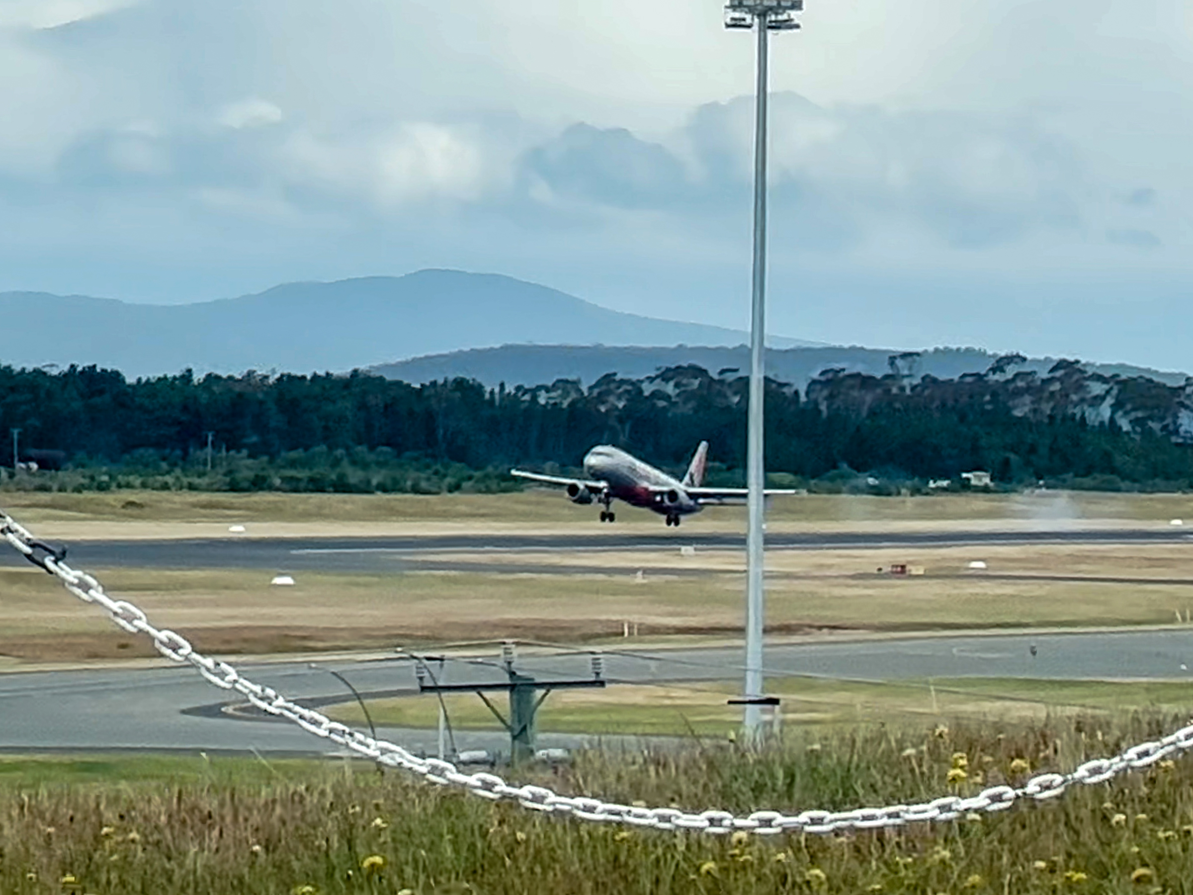 A plane lifting off from the runway