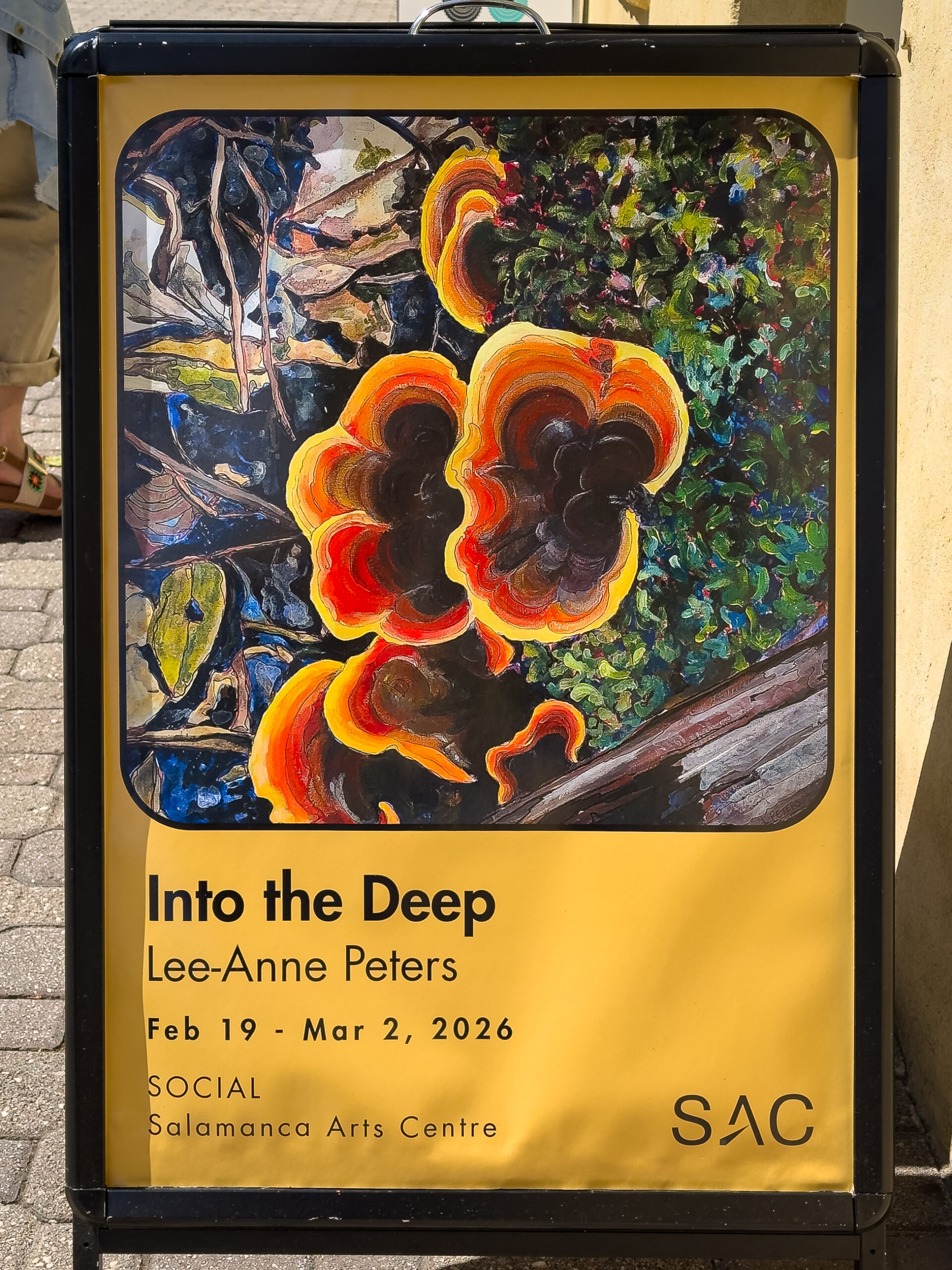 A poster with a painting of colourful fungus for an exhibition called "Into the Deep" by Lee-Anne Peters