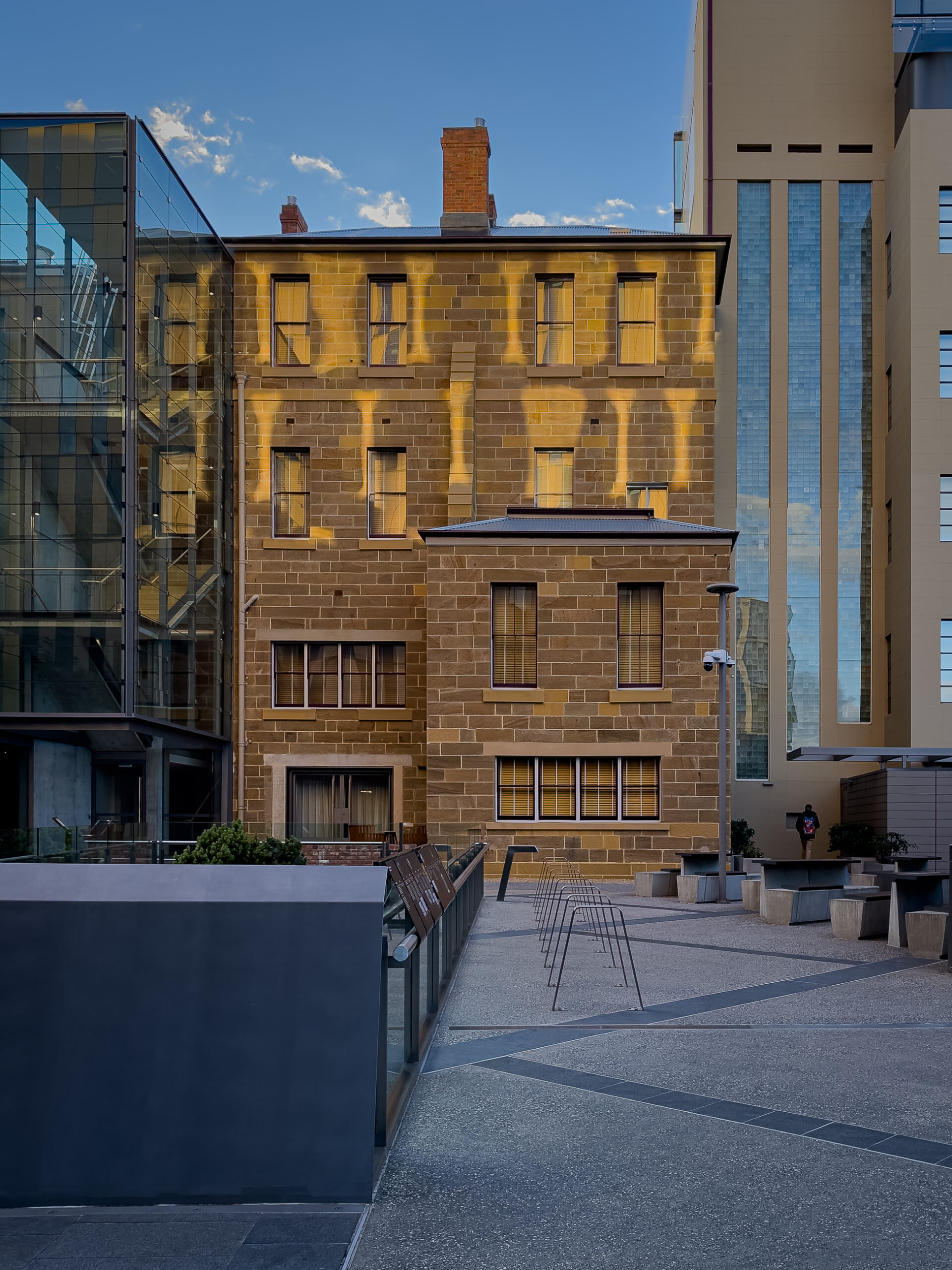 Afternoon light on the back of an old 4-level sandstone building