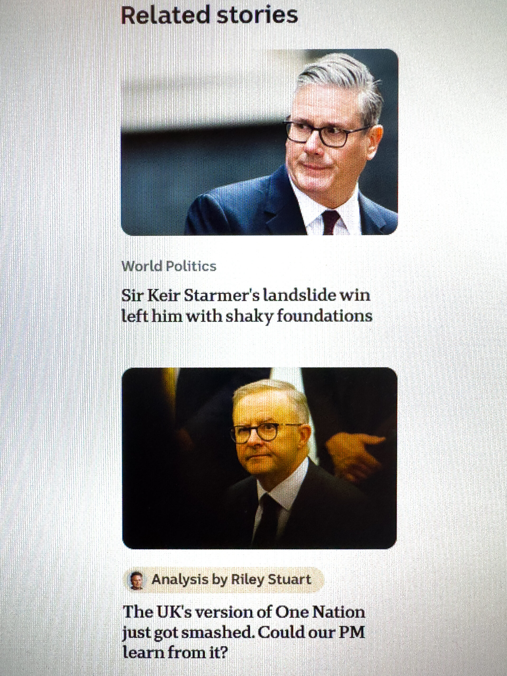 A screen shot of a website that has two photos of two middle aged me wearing glasses with the same expressions on their faces. One is the British Prime Minister Starmer and one is the Australian Prime Minister Albanese