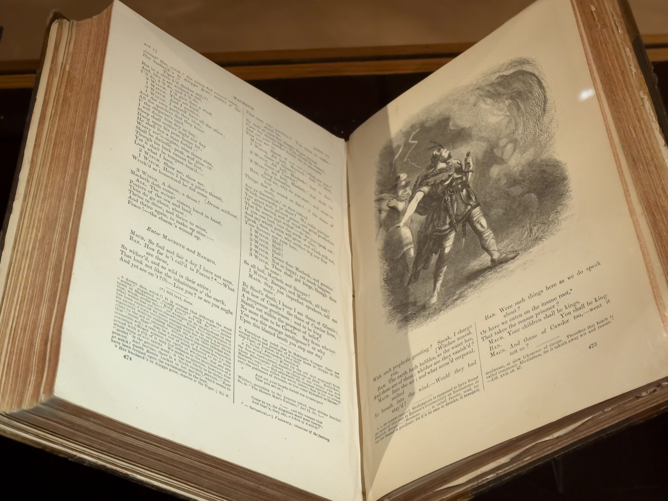 An old book opened at the page of Macbeth